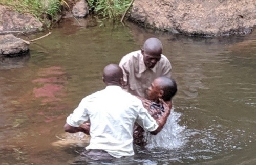 Baptizing in the river